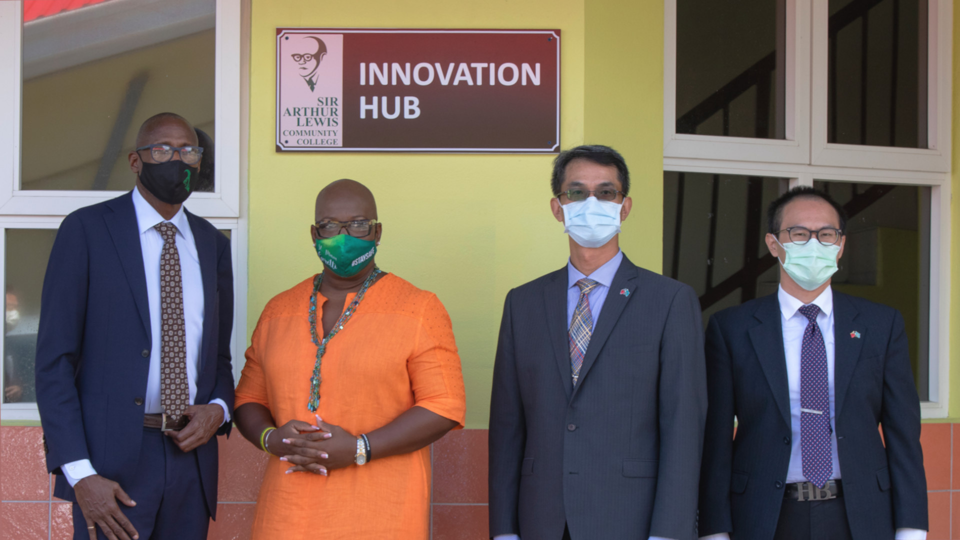 Taiwanese Ambassadors to Saint Lucia pose with Dr. Gale Rigobert and SALCC's then-principal Dr. Keith Nurse before the designated Innovation Hub.